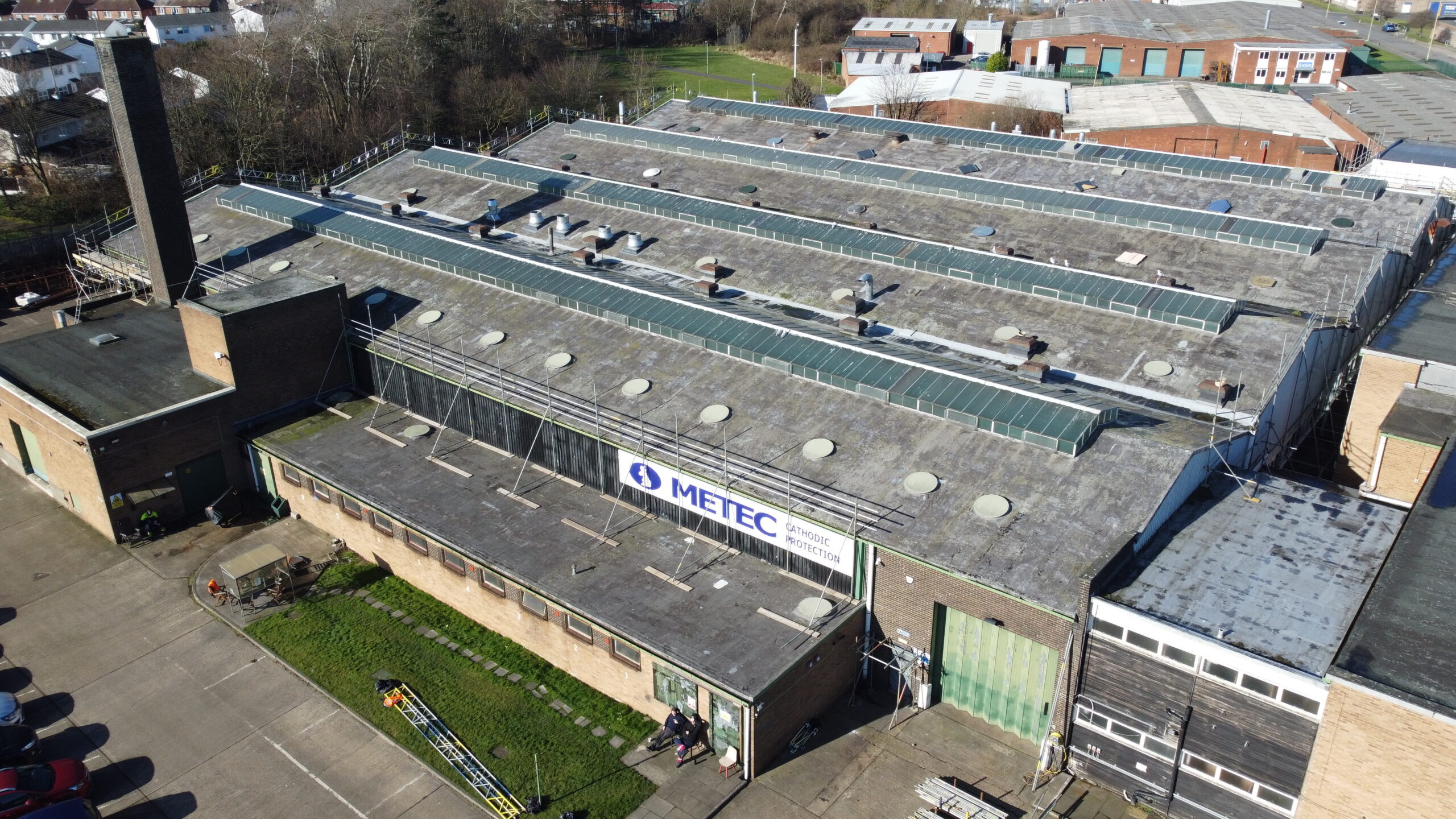 An image taken from above of Metec Catholic Protection showing the roof before Rooflcad's work.